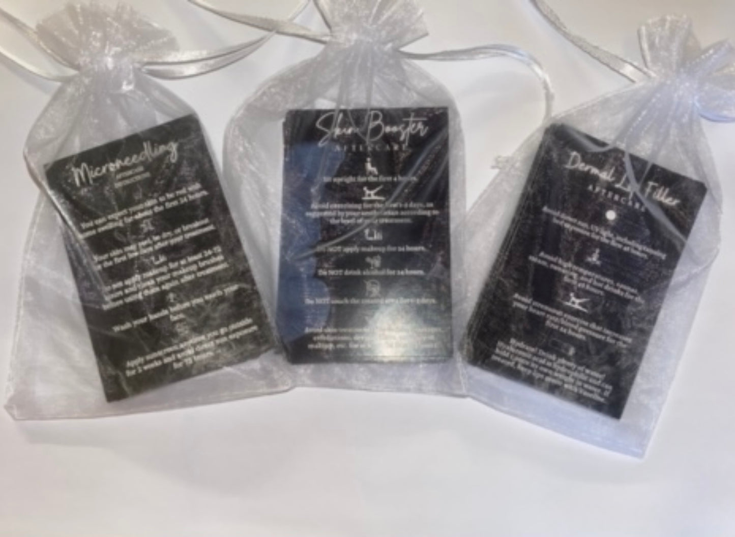 BUNDLE 50 EACH OF CUSTOMISED ARNICA LIP BALMS, LIP COMPRESSES & AFTERCARE CARDS