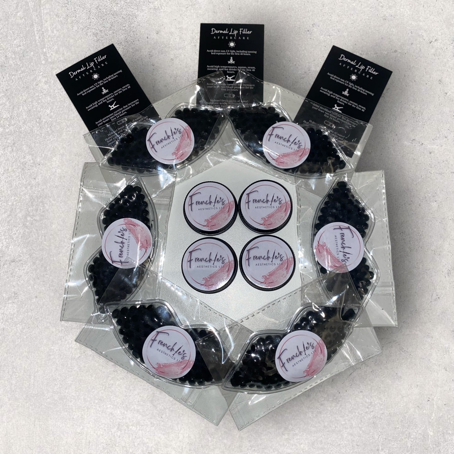 BUNDLE 50 EACH OF CUSTOMISED ARNICA LIP BALMS, LIP COMPRESSES & AFTERCARE CARDS