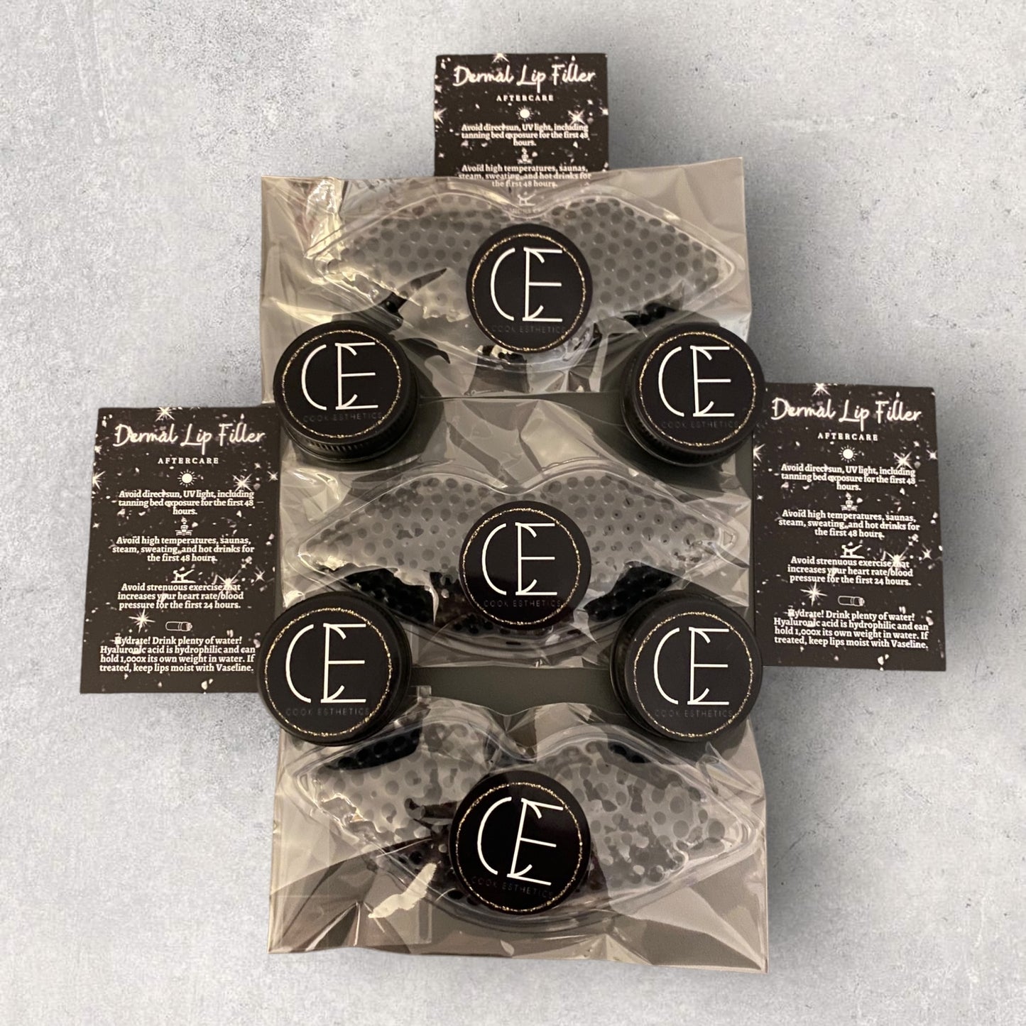 BUNDLE 50 EACH OF CUSTOMISED ARNICA LIP BALMS, LIP COMPRESSES & AFTERCARE CARDS